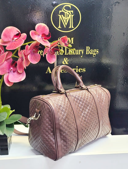 Pre-loved Gucci Guccissima Boston leather bag